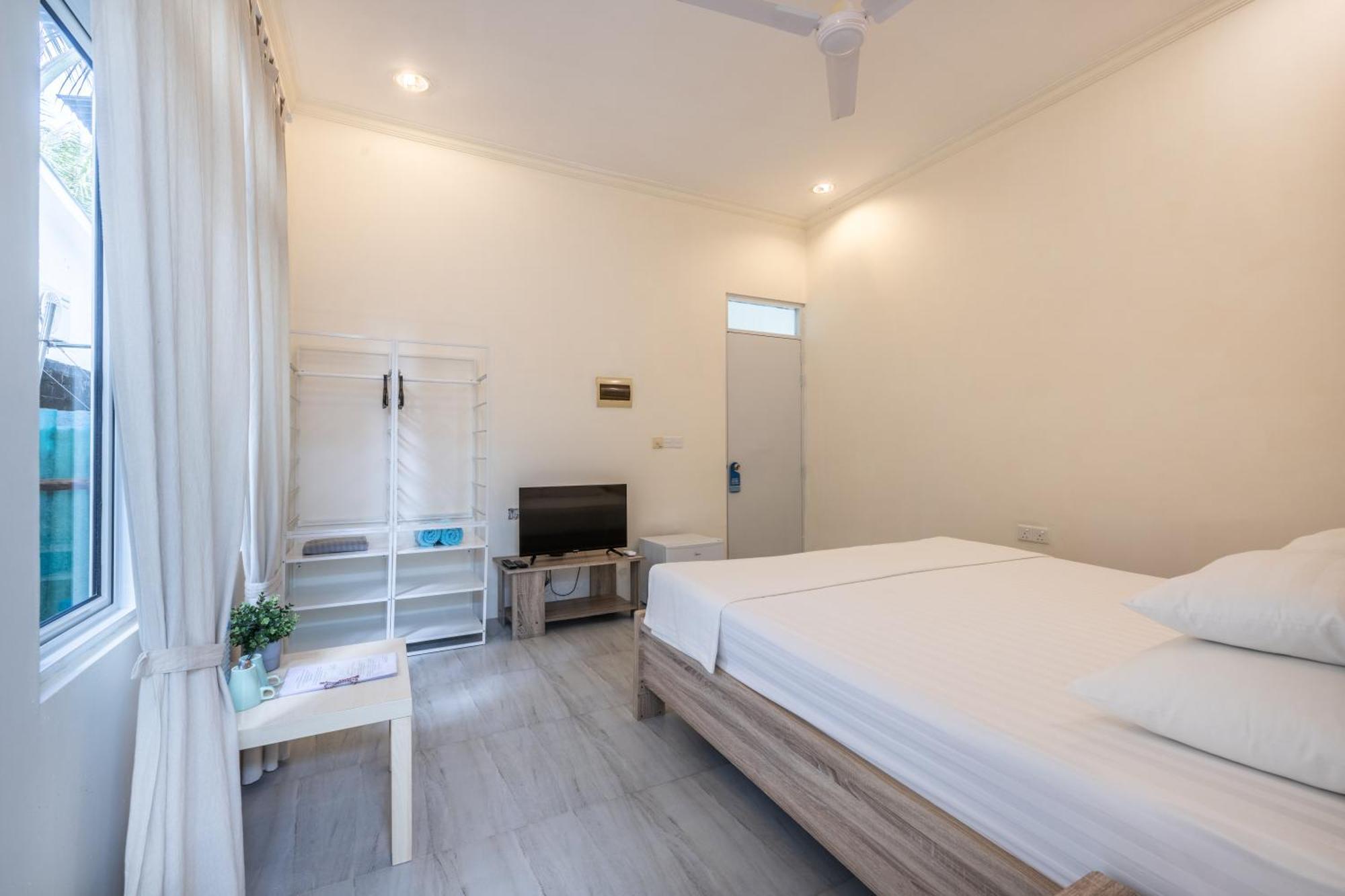 Three Hearts Guesthouse And Villas Фулхадху Номер фото